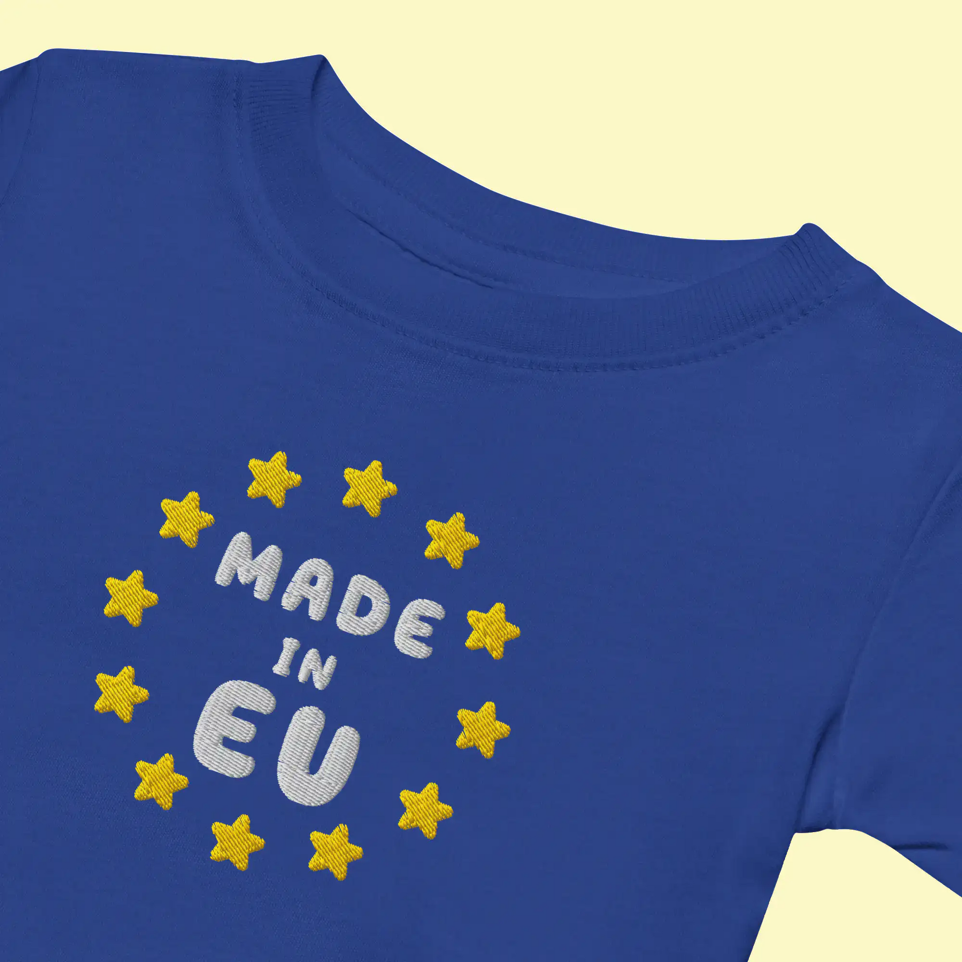 Navy Blue "Made in EU" Embroidered Baby T-shirt Front View close-up